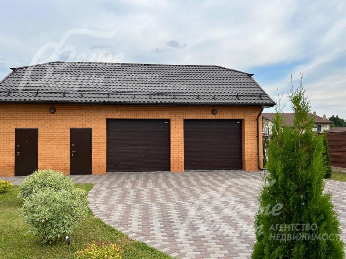 Гараж на 2 авто с сауной и гостевой спальней на 2м этаже.