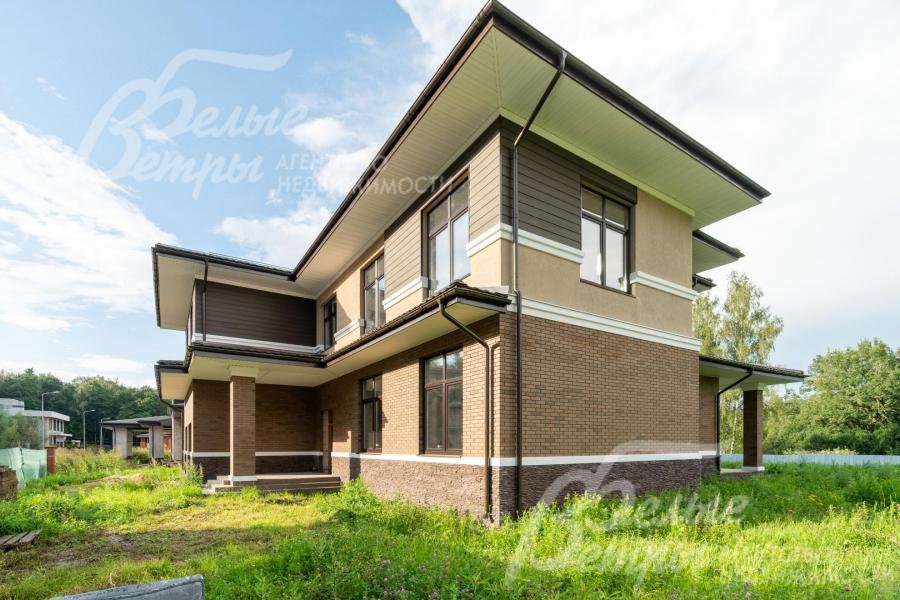 Дом с безупречной архитектурно-планировочной концепцией гармонично вписан в ландшафт участка 